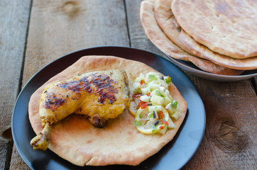 Grilled chicken with naan