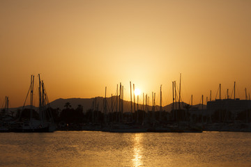 Sunset over boat harbor