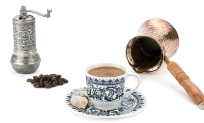 Traditional Turkish coffee with coffee pot isolated  on white