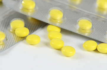 Tablets in packing. A medical background