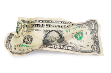 The crumpled dollar bills isolated