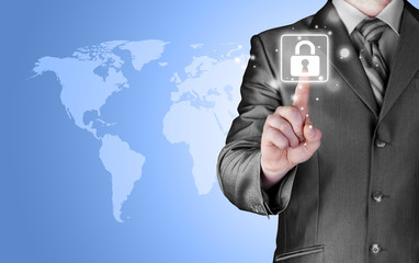 Businessman touch lock on world map  background