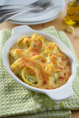Baked lumaconi with ricotta and spinach