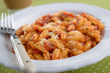 Capunti with cheese and tomato