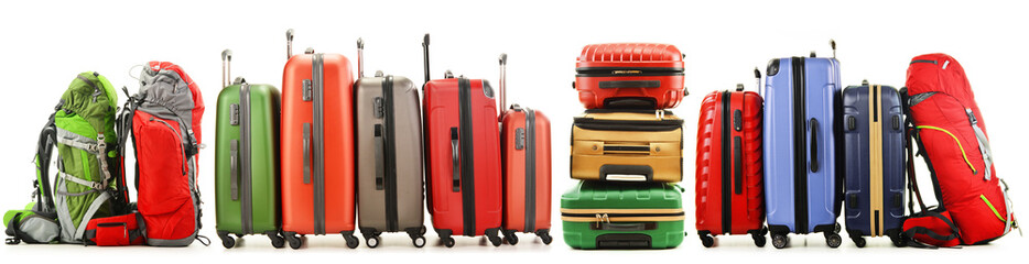 Fototapeta Suitcases and backpacks isolated on white background obraz