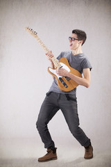 Teenager with an electric guitar