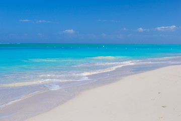 Perfect white beach with turquoise water at ideal island
