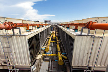 Industrial air conditioner on the roof with blue sky