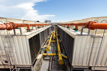 Industrial air conditioner on the roof with blue sky