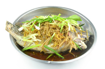 Steamed fish with soy sauce  isolated on a white background