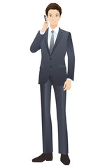 若いビジネスマン　携帯電話