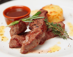 Grilled beef ribs on plate