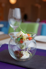 Vegetable appetizer in creative glassware