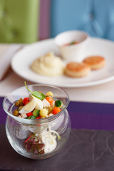 Vegetable appetizer in creative glassware