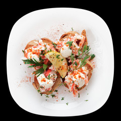 Crab meat with toast, sauce and fresh herbs