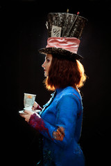 Profile of young woman in the similitude of the Hatter