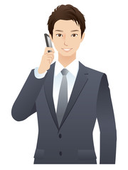 若いビジネスマン　携帯電話