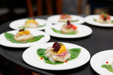 Sea scallop carpaccio dishes