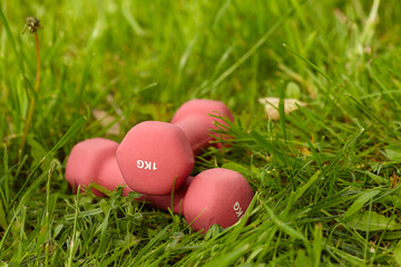 dumbells on the grass