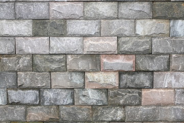 Obraz premium Shallow green stone brick wall background