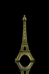 Fototapeta na wymiar Small Eiffel tower isolated
