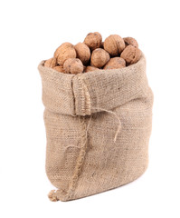 Walnuts in burlap bag.