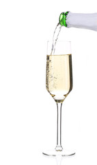 Champagne pouring in a glass.