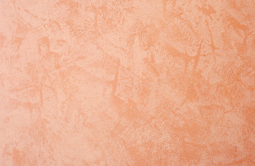 Cement wall background, orange colored.