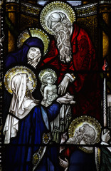 Fototapeta na wymiar Presentation of Jesus in the temple in stained glass