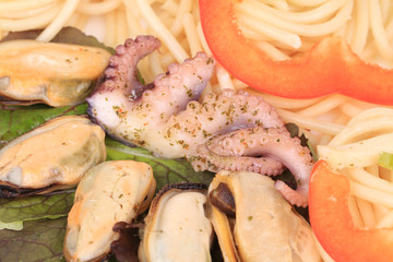 Seafood salad with spaghetti.