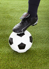 Low Section Of Player's Leg On Soccer Ball