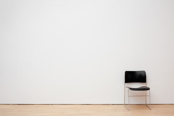 White wall texture with a chair