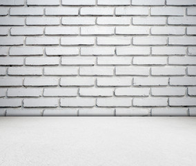 White brick wall and cement floor room in perspective.