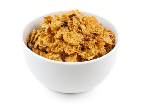 Bowl Of Bran Flakes Cereal On A White Background