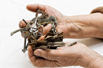 Bunch of old keys in hands.