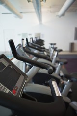 Fototapeta premium Row of cross trainer machines