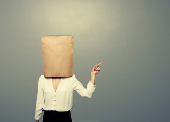woman with paper bag on the head