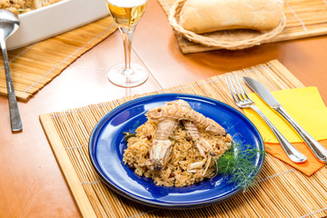 Porzione di risotto con cicale
