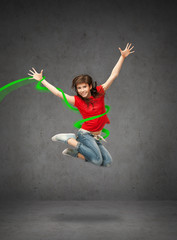 Fototapeta na wymiar happy jumping teenage girl