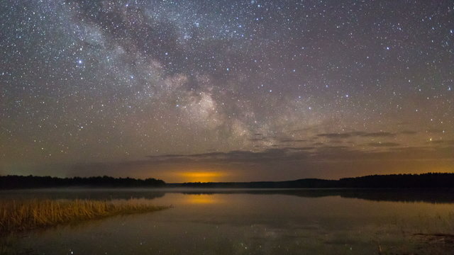 Bright Milky Way at the lake Plisa (Belarus, Eastern Europe)