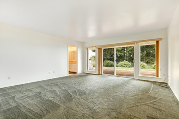 Empty master bedroom with walkout deck