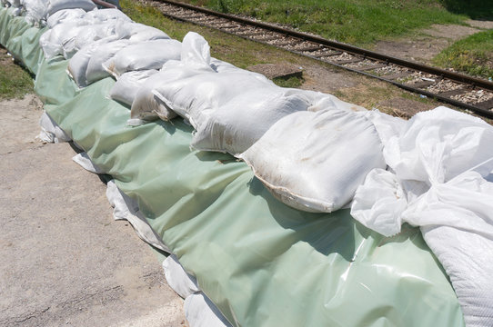 Sand Bags Protecting Rail From Flood