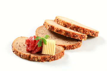 Bread with butter and salami