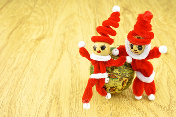 Santa standing beside the globe on right