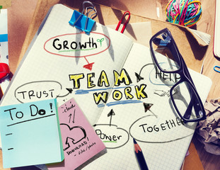Note Pad and Teamwork Concept