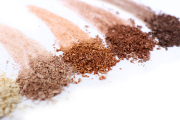 Crushed eyeshadow isolated on white