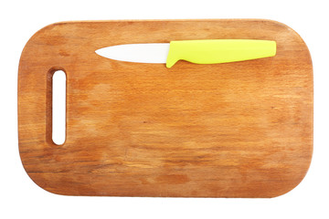 Kitchen knife and cutting board isolated on white
