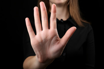 Fototapeta premium Human hand on black background