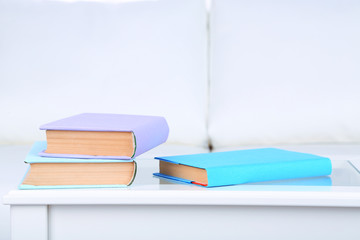 Books on coffee table in room