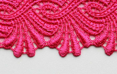 Obraz premium Pink lace material texture macro shot